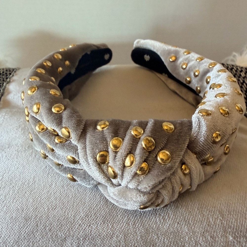 Lele Sadoughi Black and White Striped Drawstring Pouch with Gold Logo